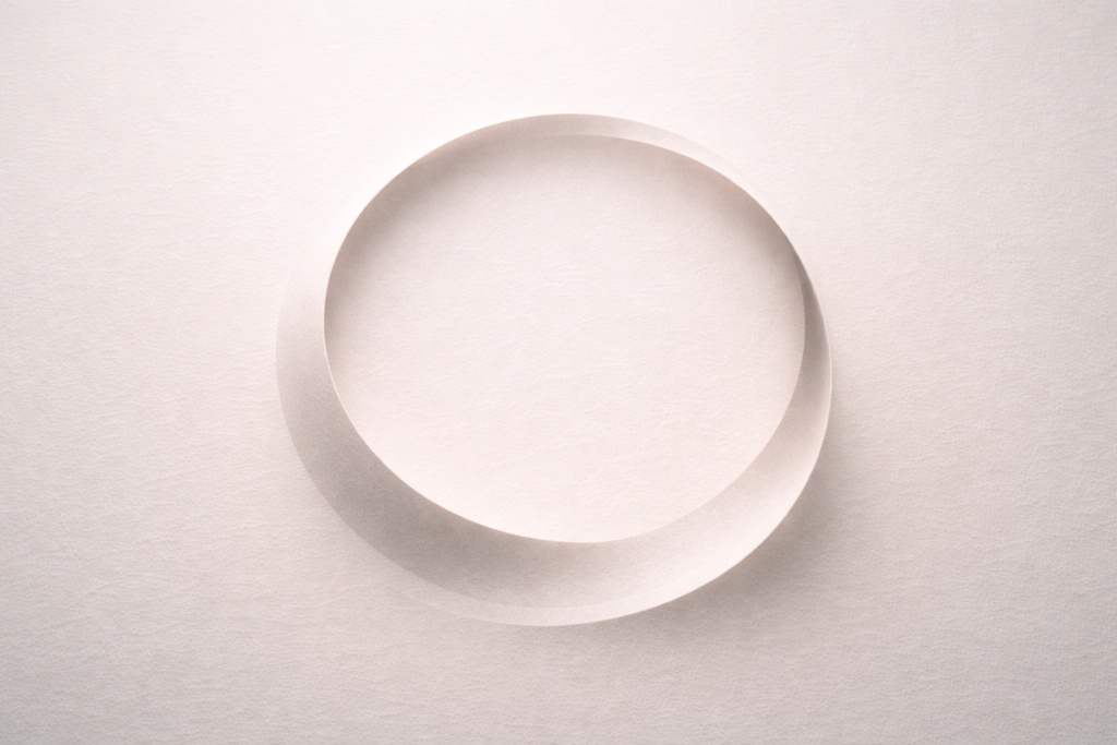 Abstract incomplete circular loop representing the emotional experience of feeling capable but stuck and ready for transformational resilience.