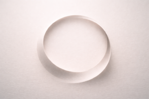 Abstract incomplete circular loop representing the emotional experience of feeling capable but stuck and ready for transformational resilience.